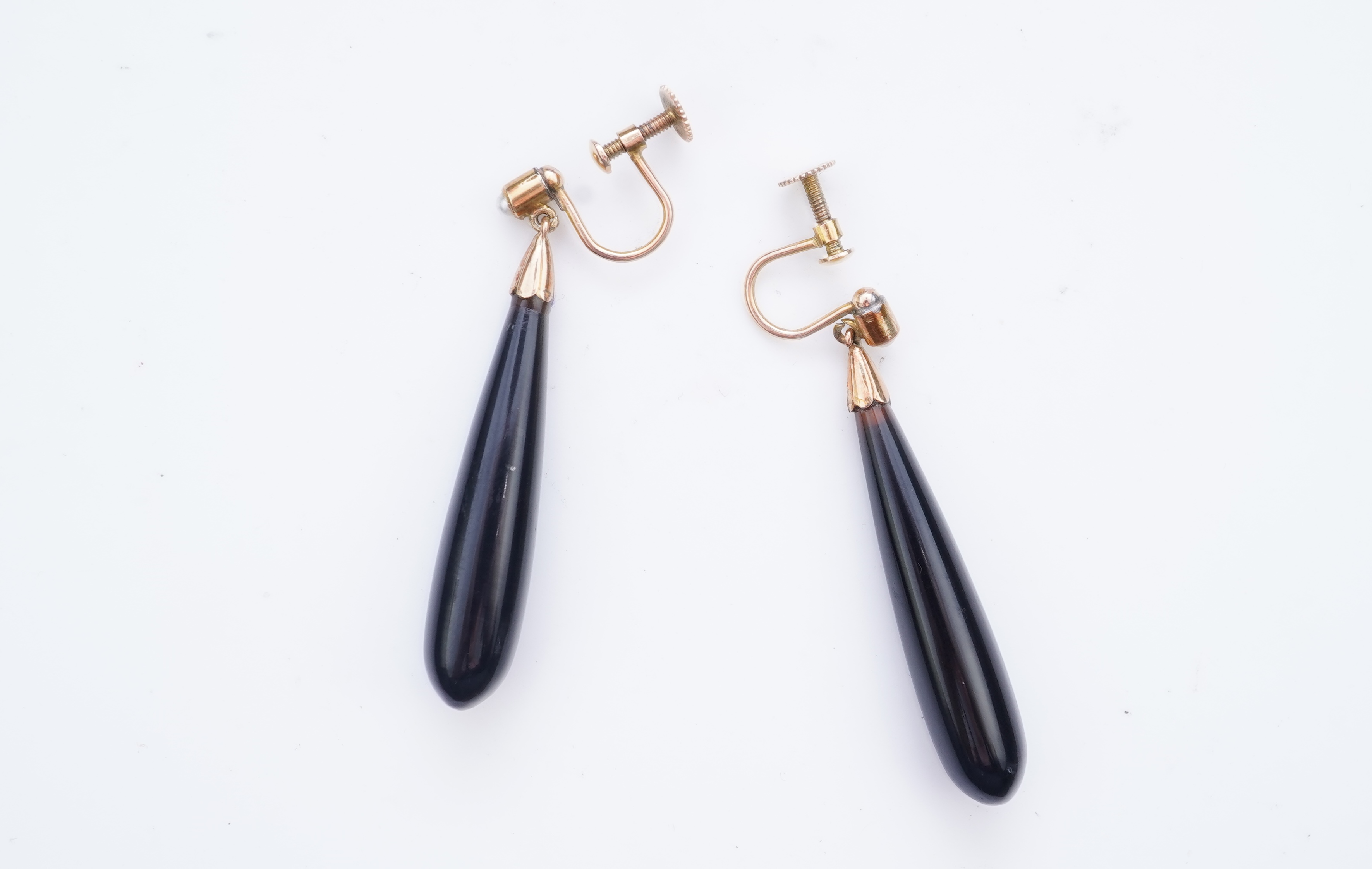 A pair of onyx and split pearl earrings, circa 1900